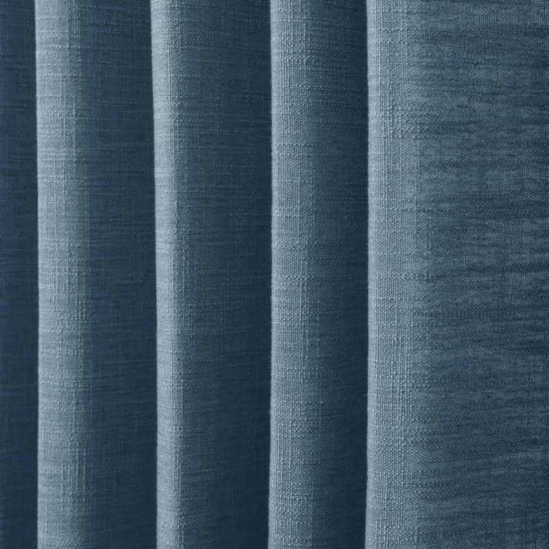 Aegean Blue Liz linen curtains in a close room detail highlighting the linen texture and colour
