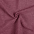 Burgundy Red Liz linen curtains drawn partly across the window with filtered light revealing the weave
