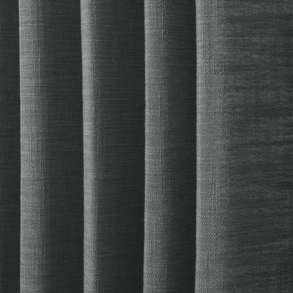 Carbon Grey Liz linen curtains in a close room detail highlighting the linen texture and colour