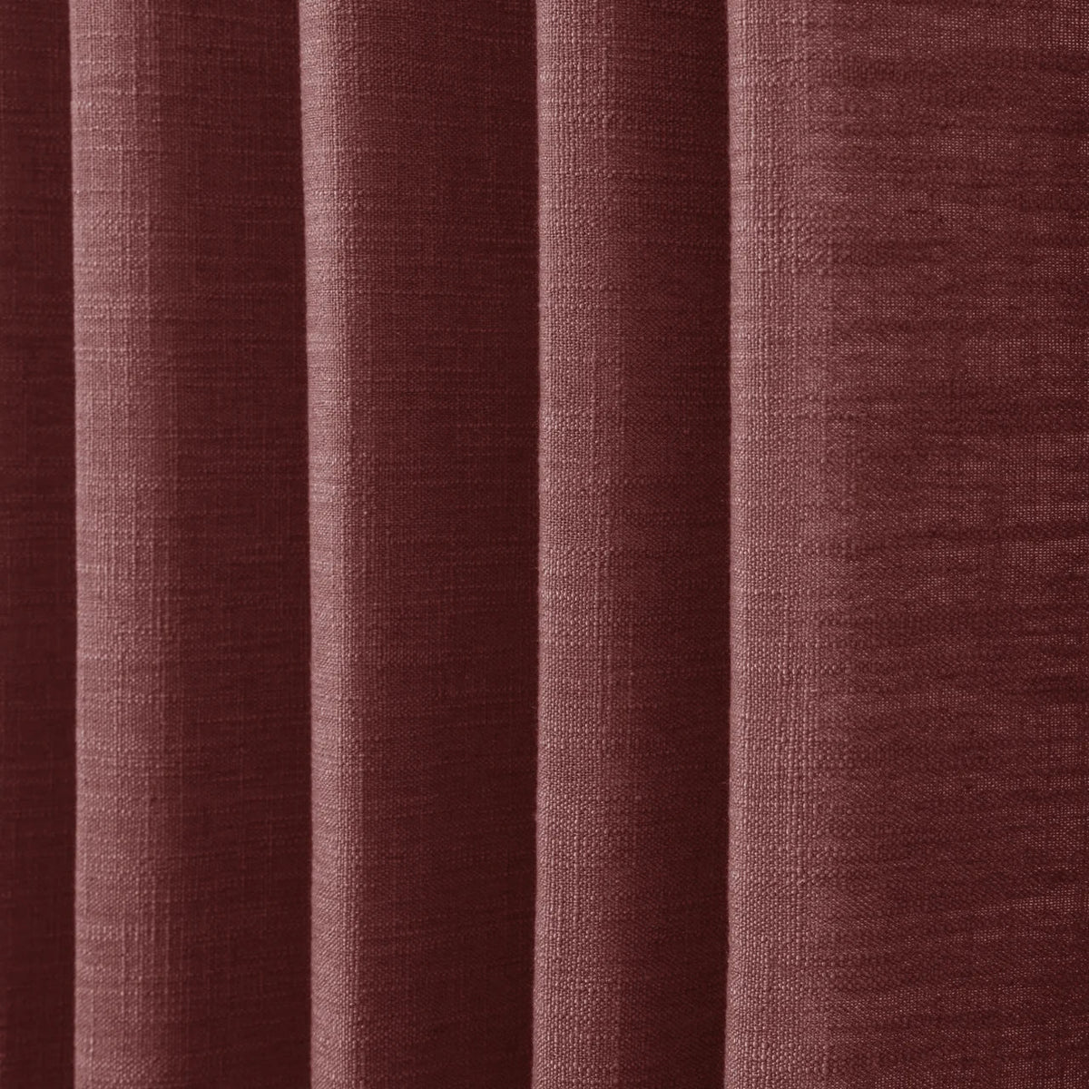 Cinnabar Liz linen curtains in a close room detail highlighting the linen texture and colour