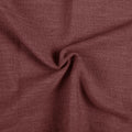Cinnabar Liz linen curtains drawn partly across the window with filtered light revealing the weave