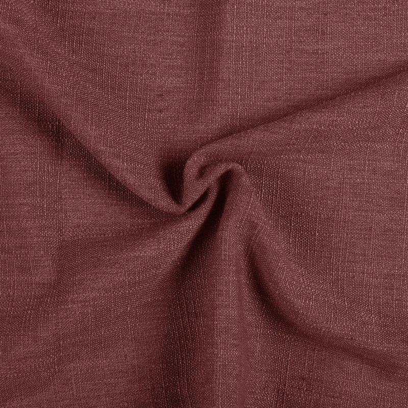 Cinnabar Liz linen curtains drawn partly across the window with filtered light revealing the weave