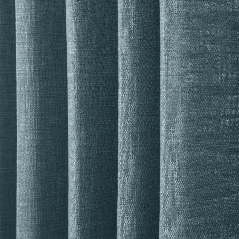 Everglade Teal Liz linen curtains in a close room detail highlighting the linen texture and colour