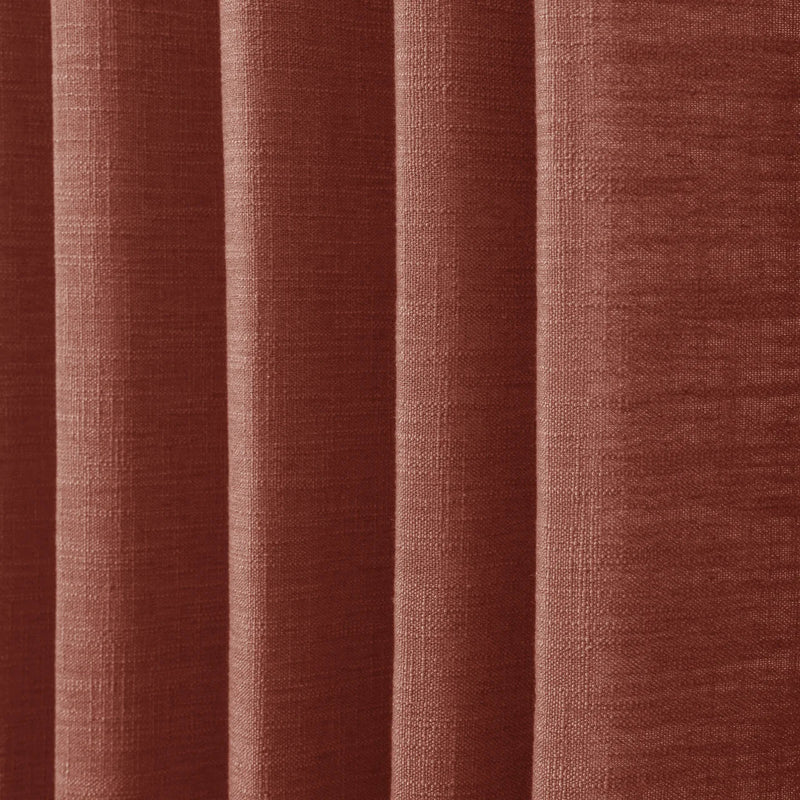 Firebrick Liz linen curtains in a close room detail highlighting the linen texture and colour