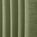 Jade Green Olive Liz linen curtains in a close room detail highlighting the linen texture and colour