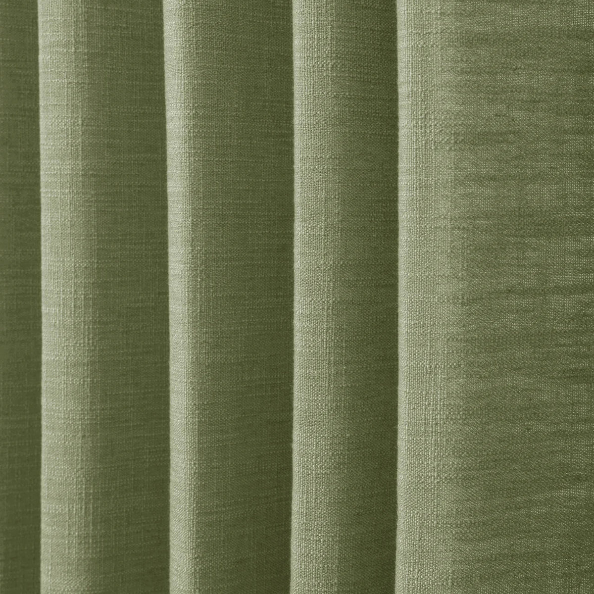 Jade Green Olive Liz linen curtains in a close room detail highlighting the linen texture and colour