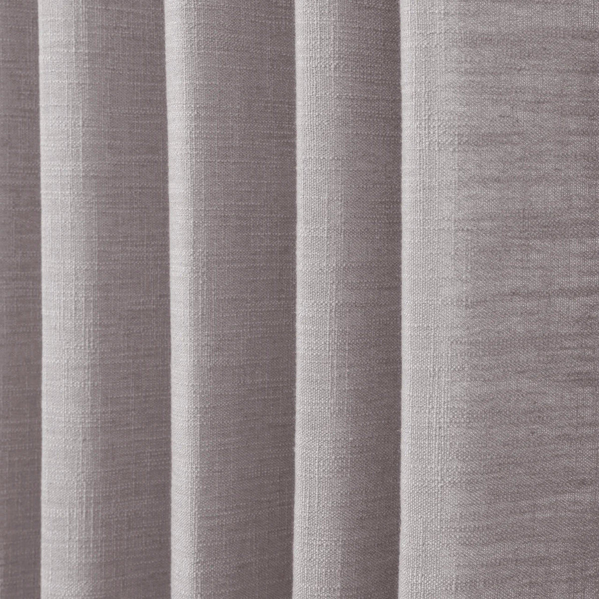 Parchment Liz linen curtains in a close room detail highlighting the linen texture and colour