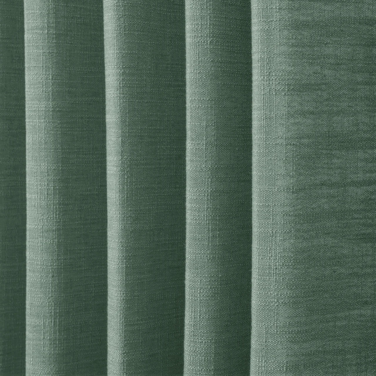 Peacock Liz linen curtains in a close room detail highlighting the linen texture and colour