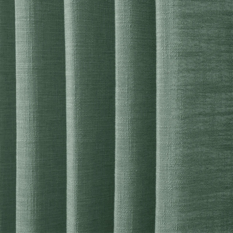 Peacock Liz linen curtains in a close room detail highlighting the linen texture and colour