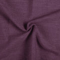 Plum Liz linen curtains drawn partly across the window with filtered light revealing the weave