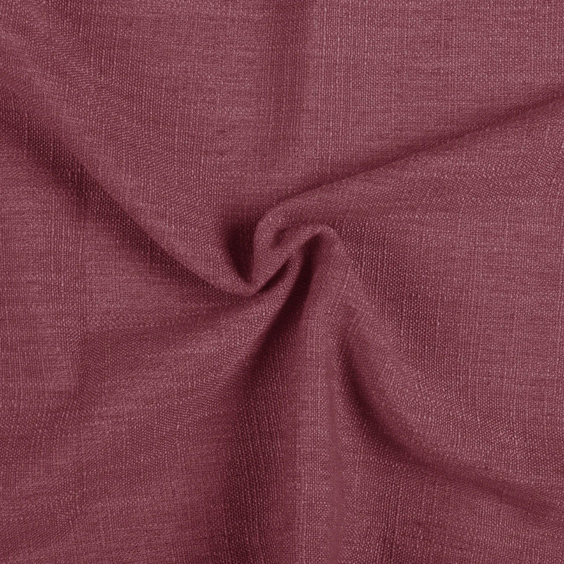 Red Wine Liz linen curtains drawn partly across the window with filtered light revealing the weave