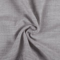 Rock Grey Liz linen curtains drawn partly across the window with filtered light revealing the weave