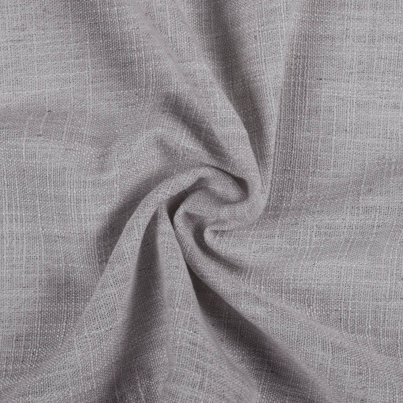 Rock Grey Liz linen curtains drawn partly across the window with filtered light revealing the weave