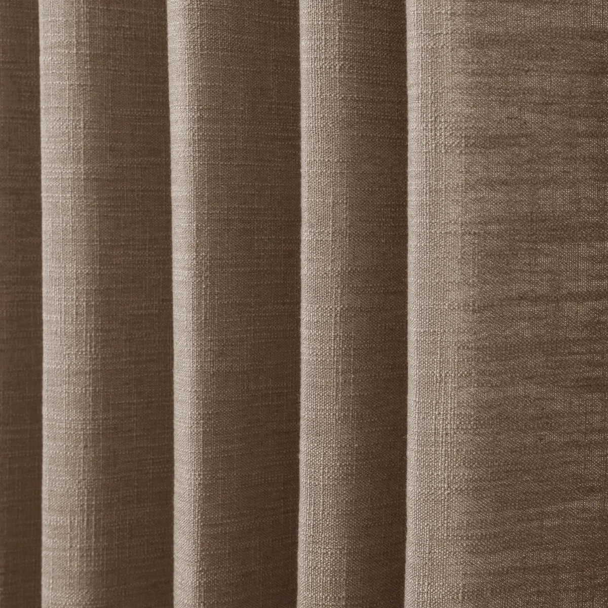 Rust Brown Liz Linen Pleated Curtains dense linen weave shown in deep vertical folds